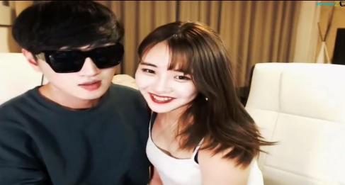 Korean girl kissing warmly in front of webcam
