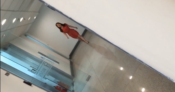 Chinese girl in orange dress pissing in game company - Chinese pissing porn video