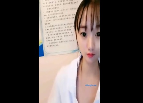 Small Chinese nurse working in the hospital