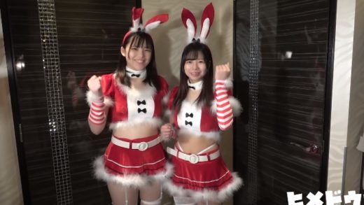 Two Japanese girls complete looks in christmas costumes