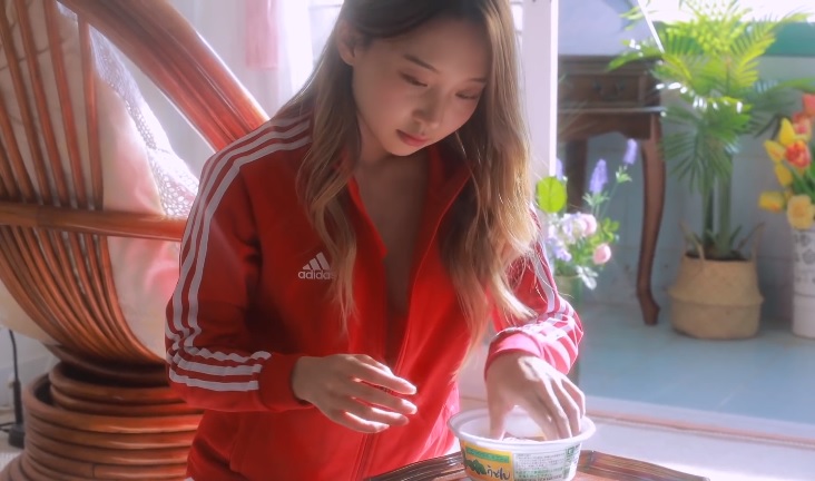 sexy Korean girl making udon noodles